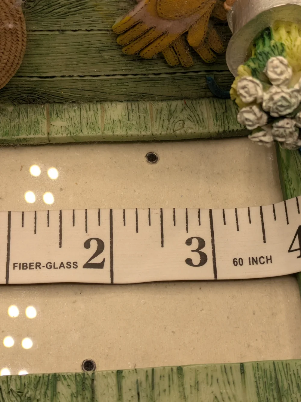 Green Wooden Bench Picture Frame with Hat and Potted Flowers